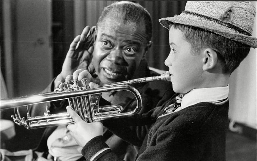 Louis Armstrong The Jazz Legend With Child Actor And Musician Enrico Tomasso.