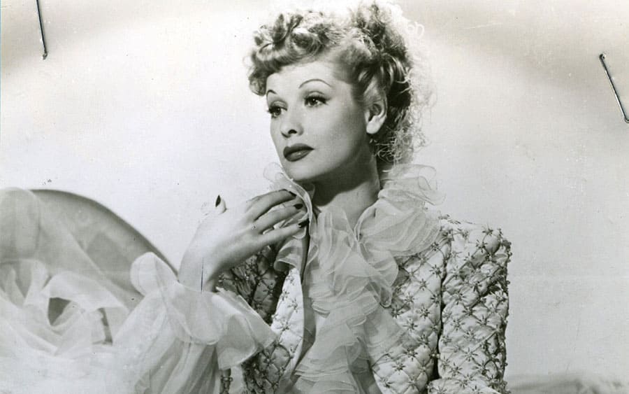 Lucille Ball, Hollywood Star, Rests Between Takes at Her Studio