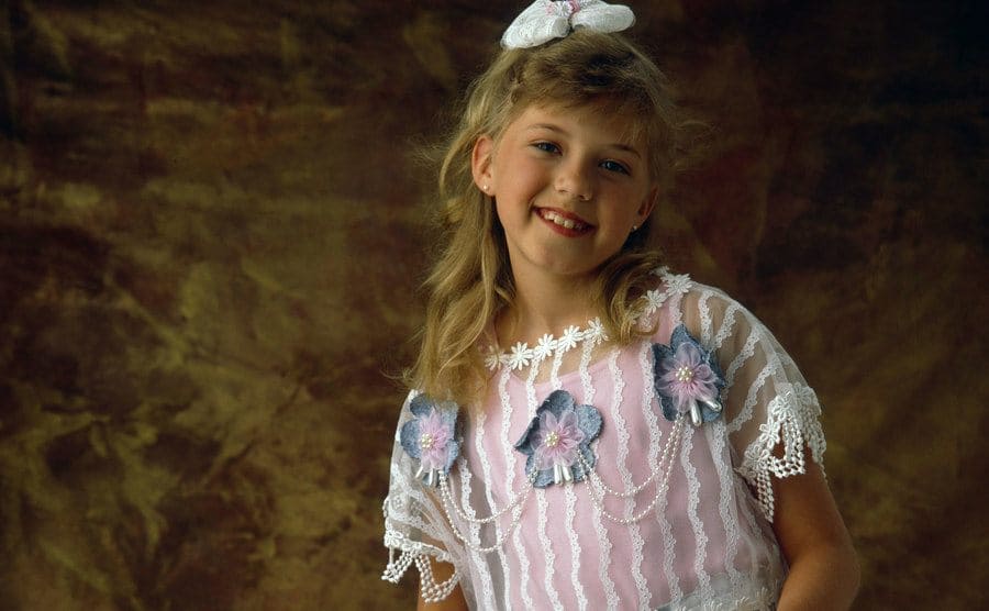 Jodie Sweetin as Stephanie Tanner in a promotional photograph 