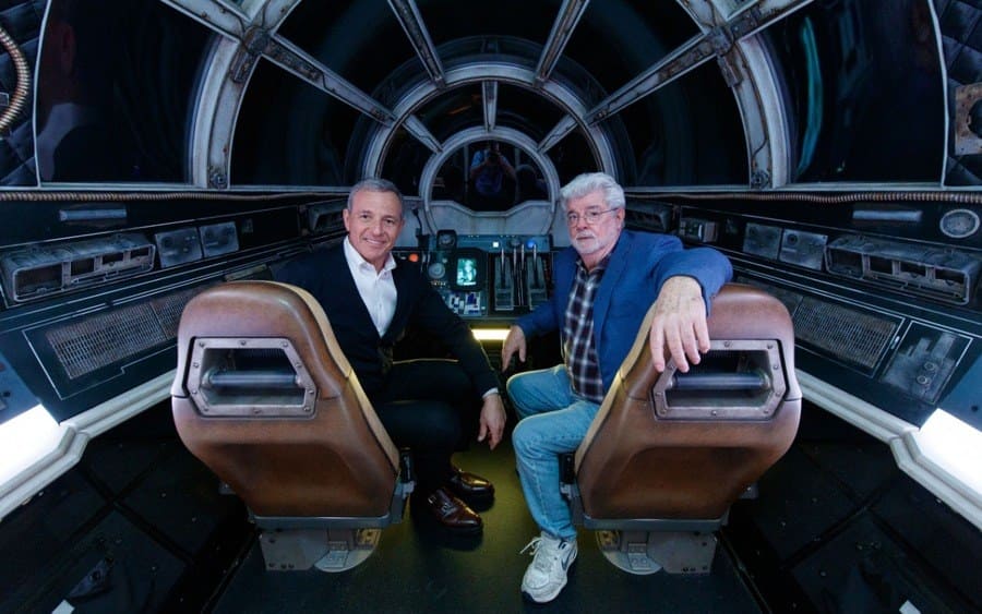 Walt Disney Company Chairman and CEO Bob Iger (R), and Star Wars creator George Lucas pose inside Millennium Falcon