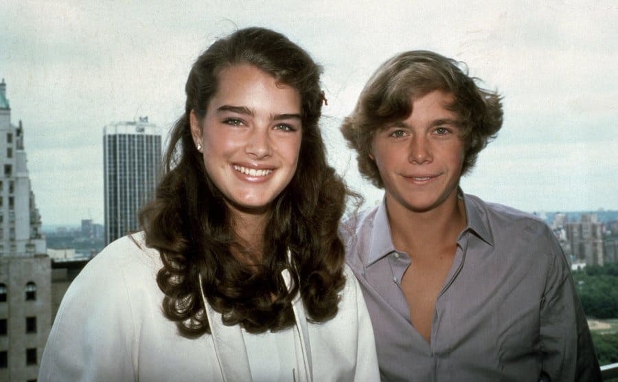 Brooke Shields and Christopher Atkins posing together 