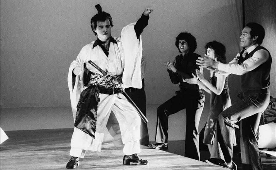 John Belushi performing on SNL in a skit called Samurai Night Fever 