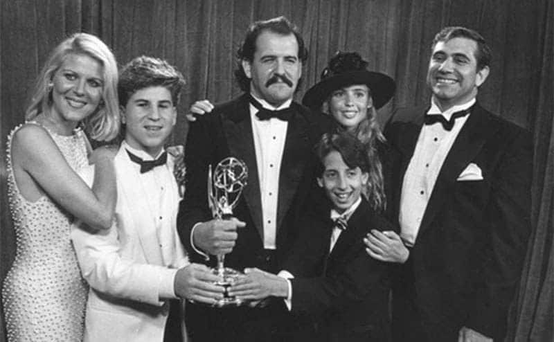 The Cast of The Wonder Years posing with their Emmy Award. 