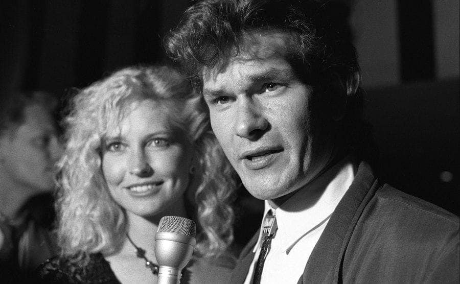 Patrick Swayze, right, and his wife Lisa Niemi, left, are interviewed by the media during a party for the premiere of his film 