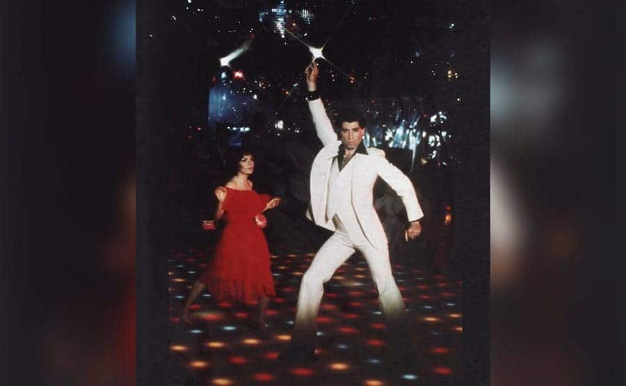 John Travolta Striking a pose on the dance floor in the film 'Saturday Night Fever.