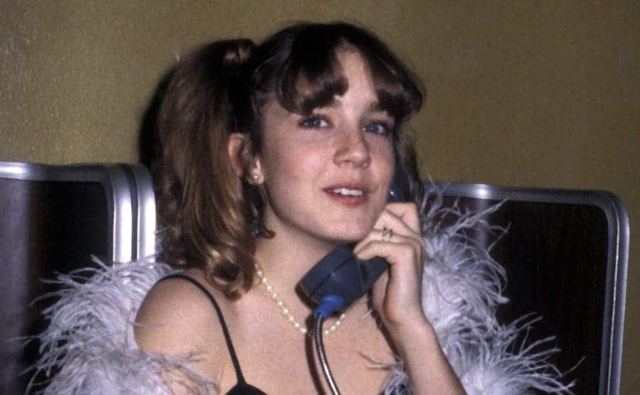 Dana Plato talks on a payphone during the Sixth Annual People's Choice Awards.