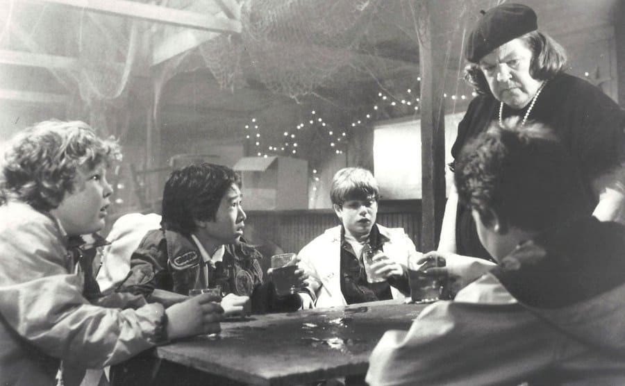 Mama Fratelli is intimidating the little boys in a scene from ‘The Goonies’. 