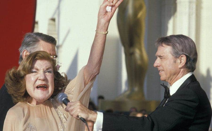 Anne Ramsey is giving an interview on the red carpet of the 60th Annual Academy Awards.