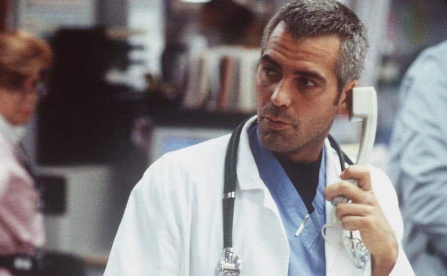 George Clooney in an episode of ER talking on the phone.