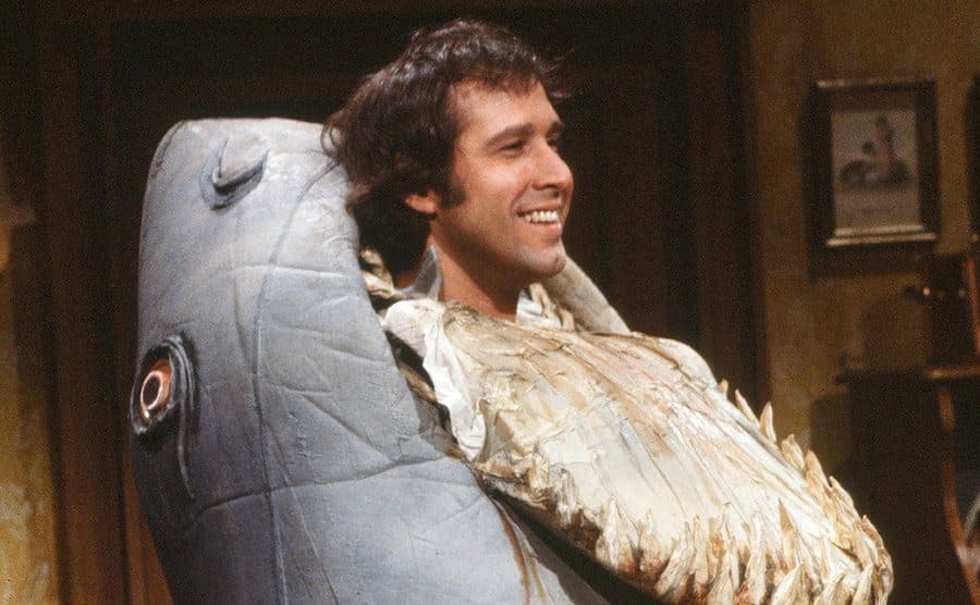 Chevy Chase is dressed in his iconic 'landshark' costume in SNL.