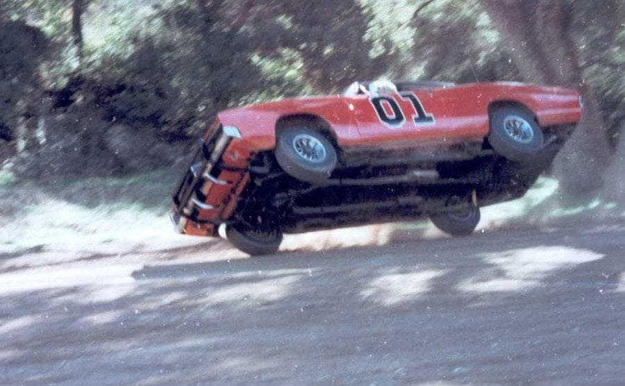 A car stunt in a still from The Dukes of Hazzard’s TV show.