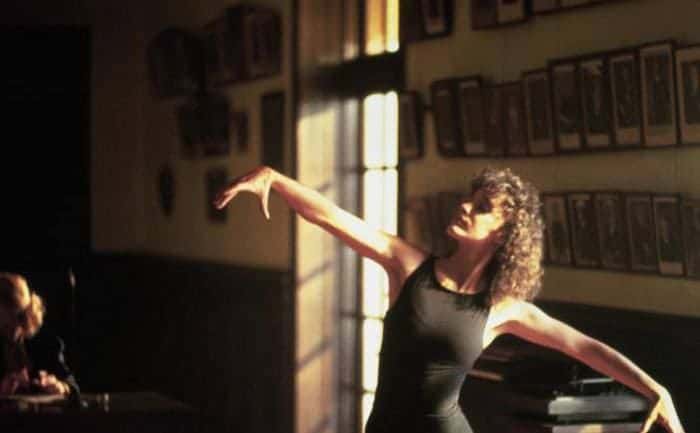 Jennifer Beals is dancing in a still from the movie Flashdance. 