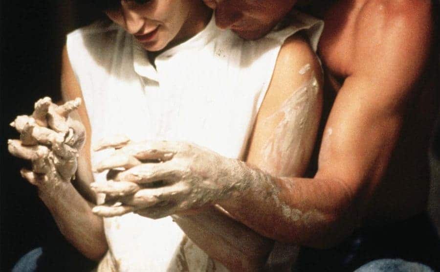 Scene where Demi Moore and Patrick Swayze are embracing as they make pottery on the wheel.
