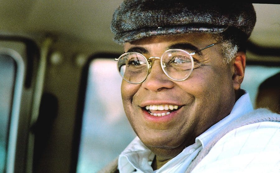 James Earl Jones is smiling in a still from the movie. 