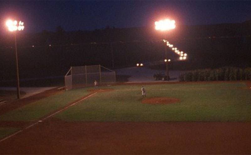 Cars are seen arriving at the field at night in the last scene of the movie. 
