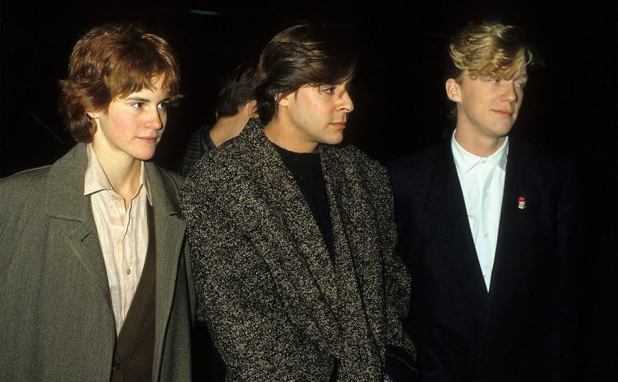 Ally Sheedy, Judd Nelson, and Anthony Michael Hall are arriving at an event. 