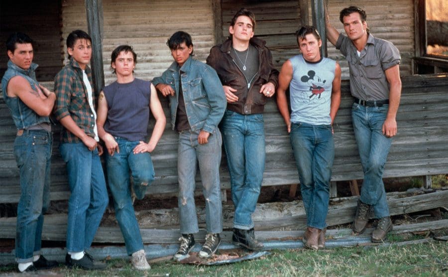 Tom Cruise, Rob Lowe, C. Thomas Howell, Ralph Macchio, Matt Dillon, Emilio Estevez and Patrick Swayze on the set of The Outsiders. 