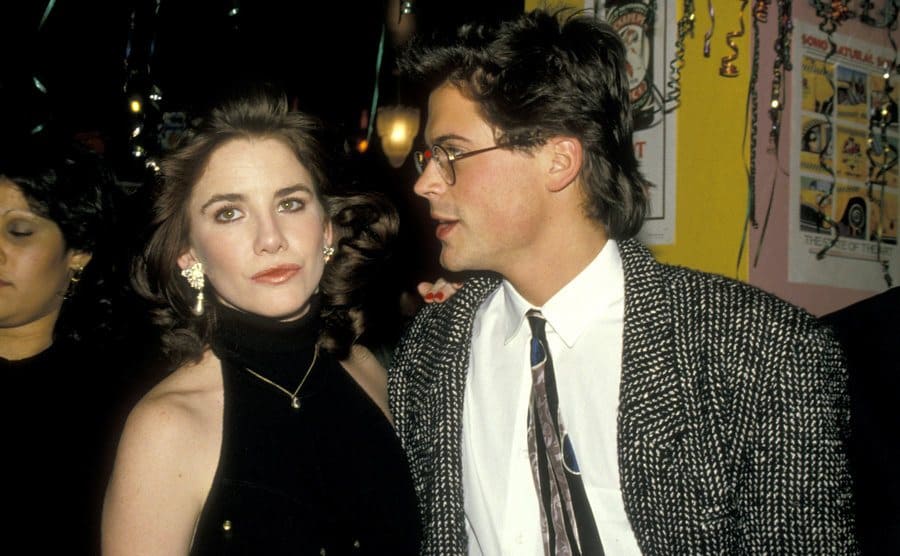 Melissa Gilbert and Rob Lowe at a party. 