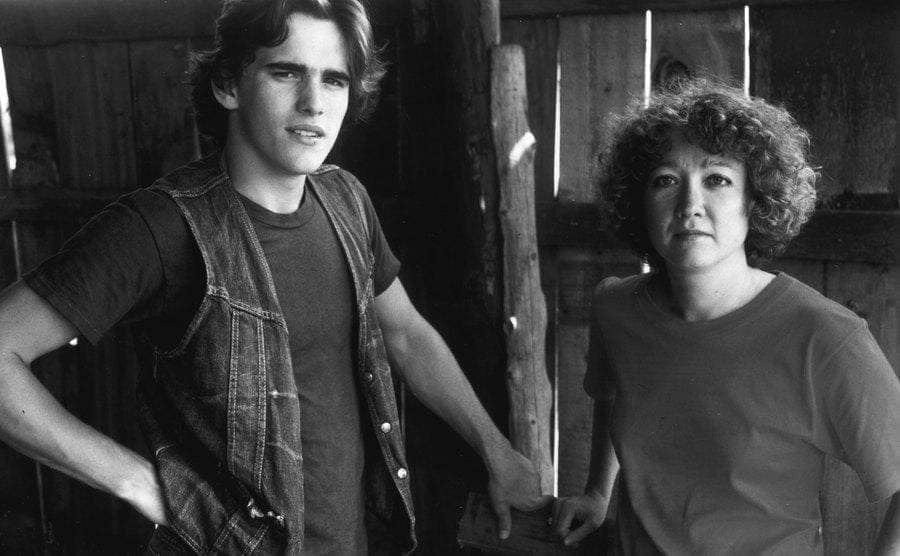 Matt Dillon with Susan Hinton posing together for a portrait.