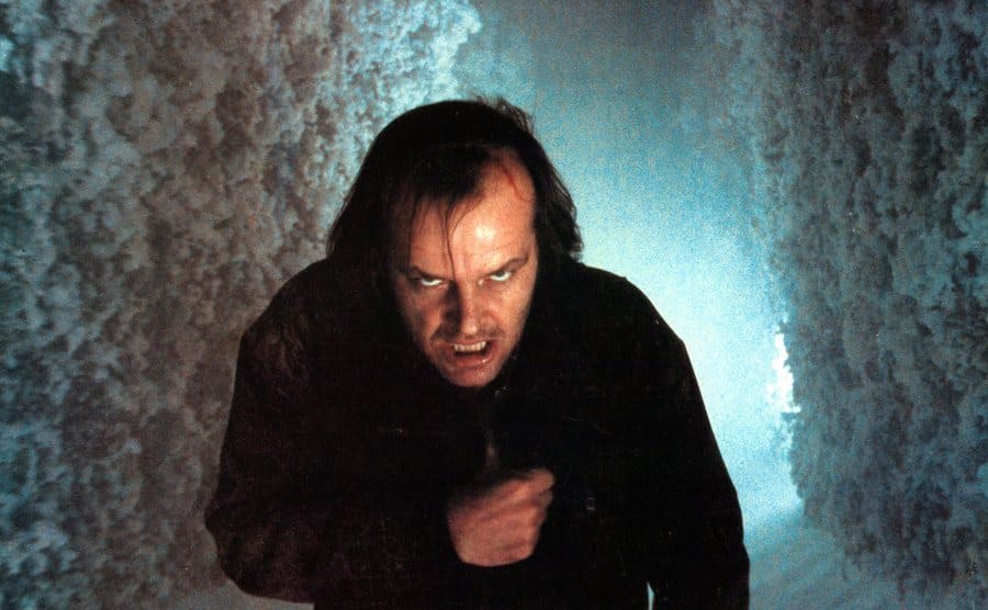 Jack Nicholson walking through snowy maze. 