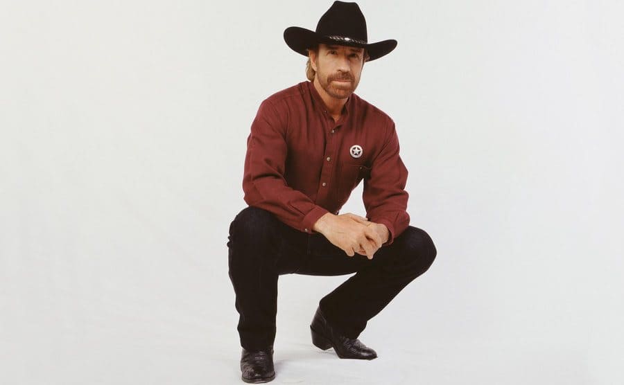 Chuck Norris looks like a real cowboy in a still from Walker, Texas Ranger. 
