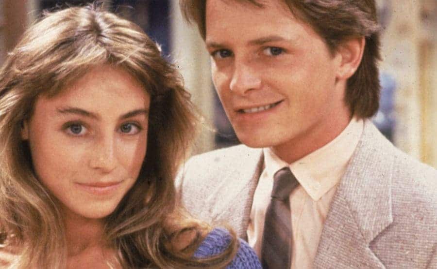 Promotional portrait of Tracy Pollan and Michael J. Fox on the set of Family Ties.