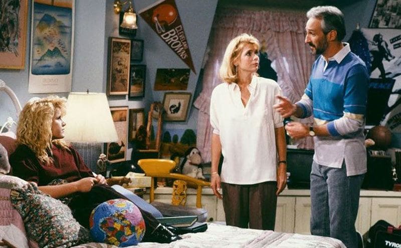 Tina Yothers, Meredith Baxter, and Michael Gross in a scene inside Tina's bedroom.