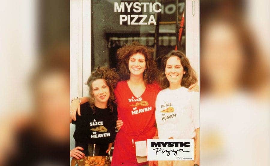 Roberts, Taylor, and Gish pose outside of the Mystic Pizza location. 
