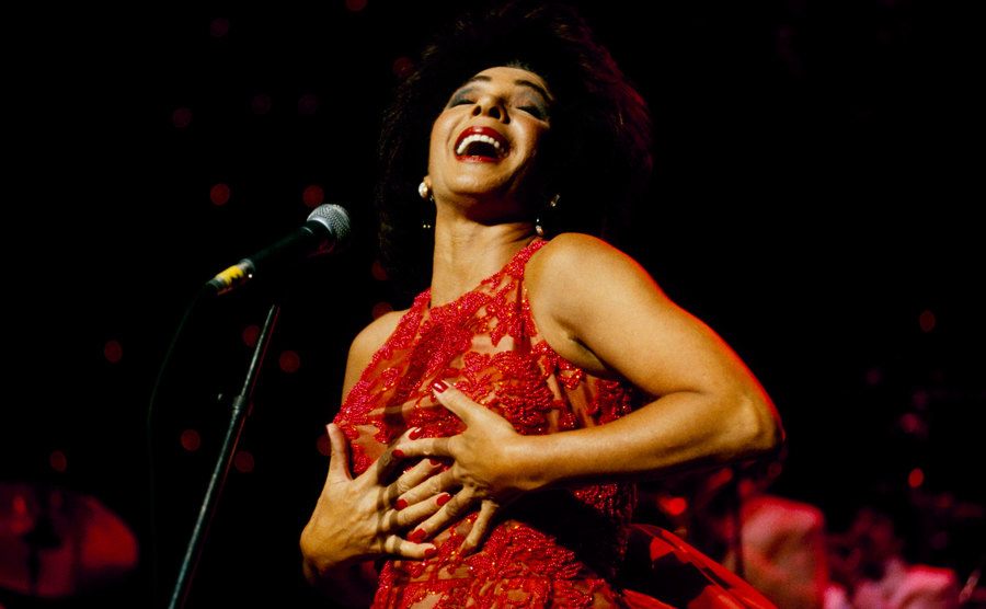 Welsh singer Shirley Bassey performs live on stage circa 1995.