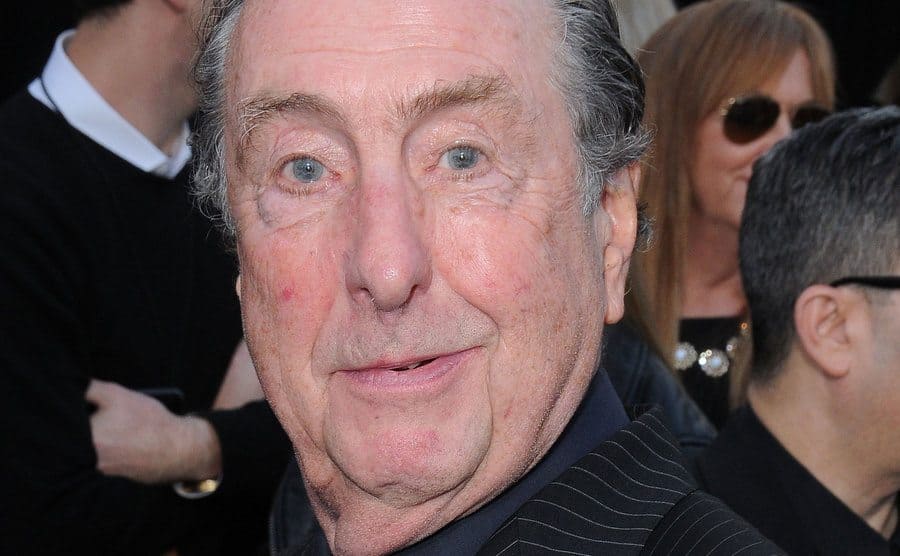 Eric Idle attends an event. 