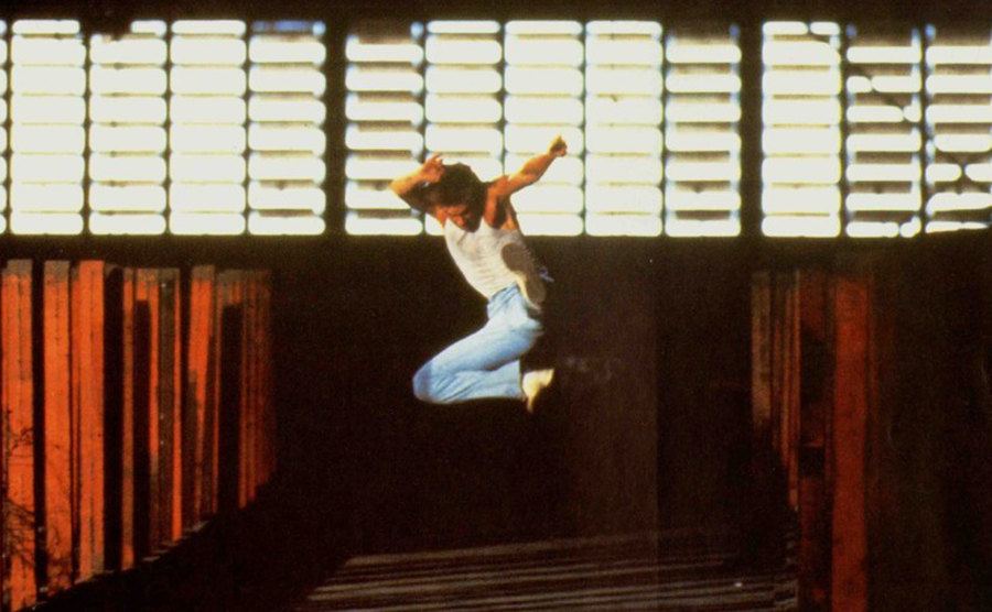 Kevin Bacon dances in a still from the film.
