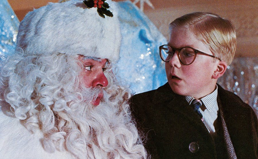 Peter Billingsley sits on Santa's lap in a scene from the film 'A Christmas Story.' 