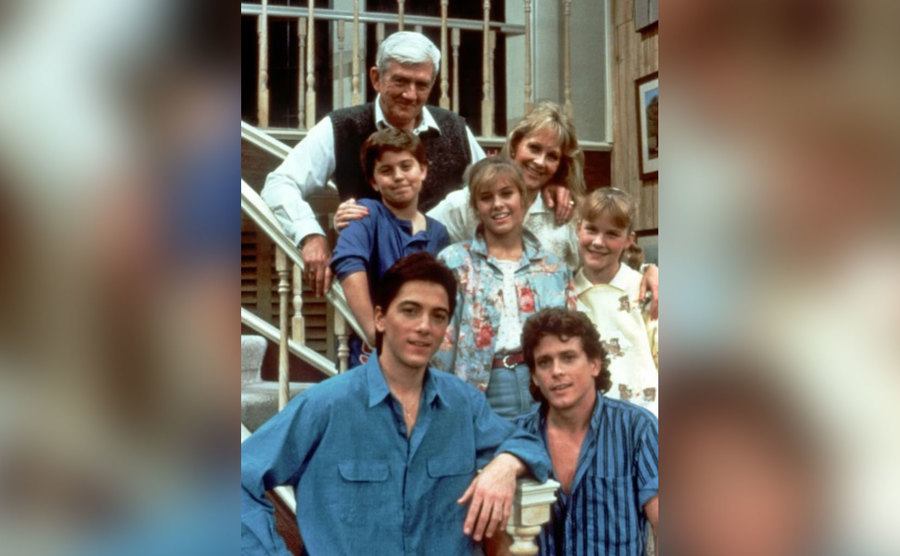 A “family” photo of the cast of Charles in Charge. 