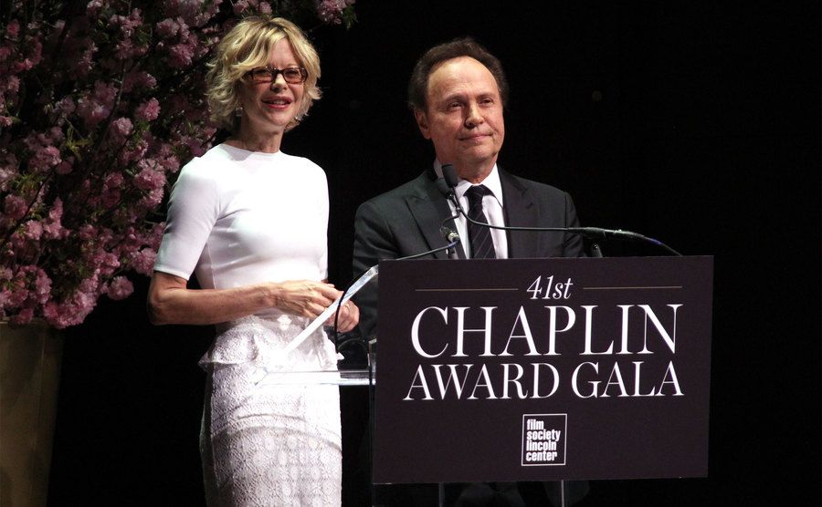 Meg Ryan and Billy Crystal speak onstage at the 41st Annual Chaplin Award Gala
