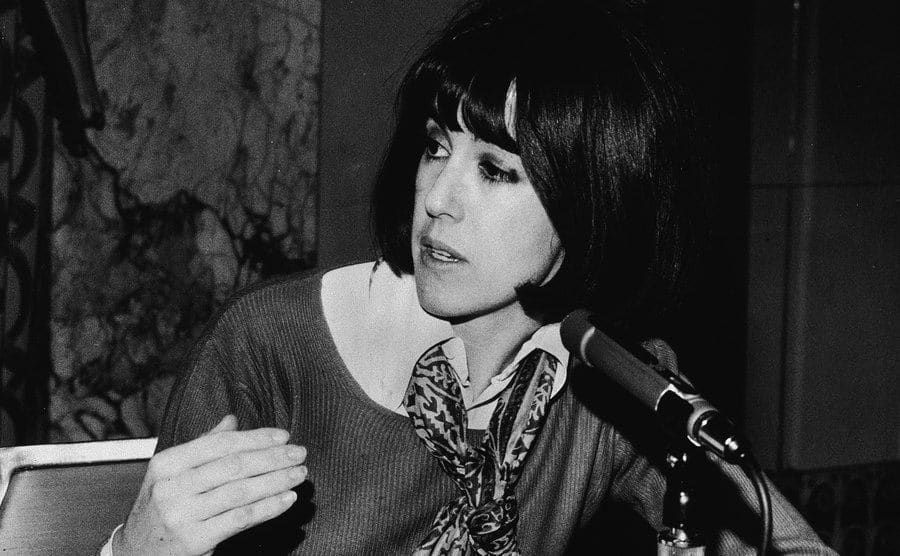 Nora Ephron gestures while speaking during a 'Women in Literature' conference. 