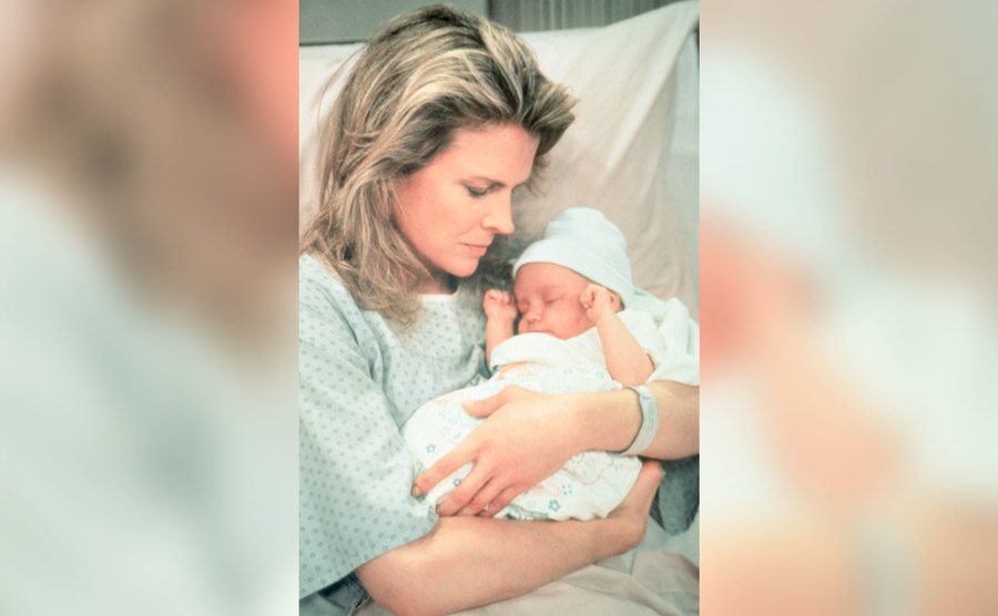 Murphy Brown, played by Candice Bergen, holds her newborn son Avery. 