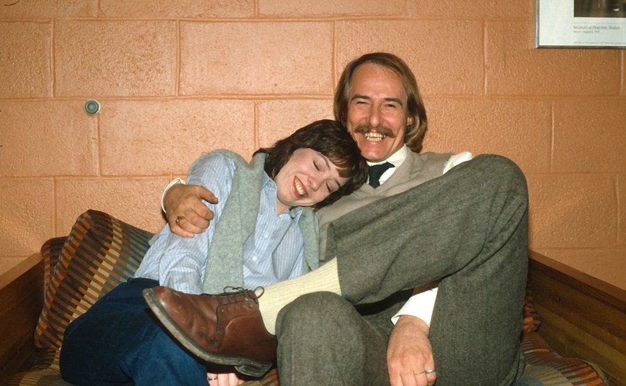 John and Mackenzie Phillips pose for a photograph backstage. 