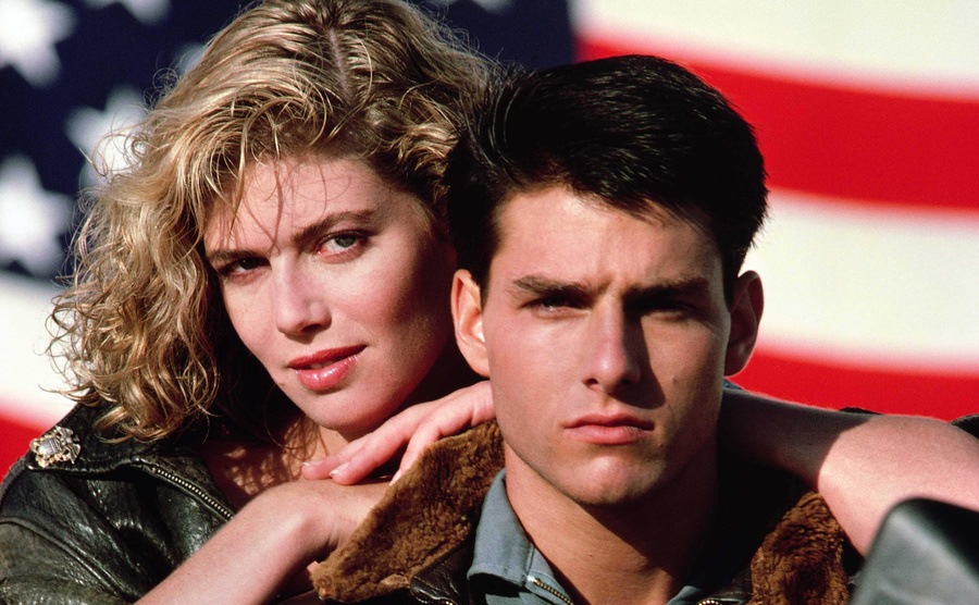 Tom Cruise and Kelly McGillis pose on the set of Top Gun. 