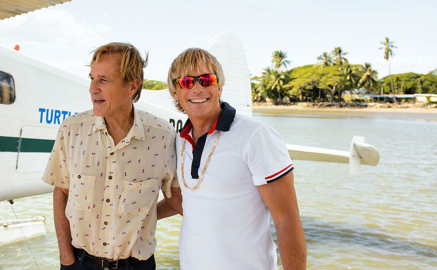 A picture of Randal Kleiser and Christopher Atkins revisiting the island. 