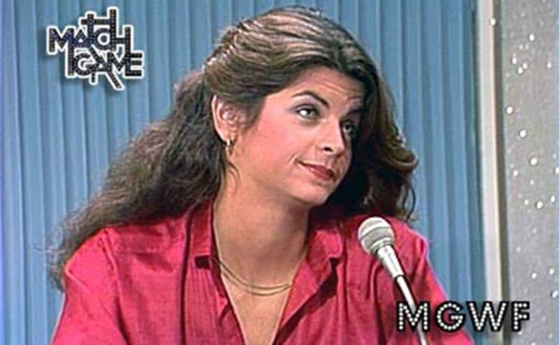 Kirstie Alley is in a still from a television game show.