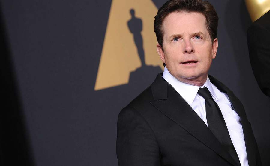 Michael J. Fox poses for the press.