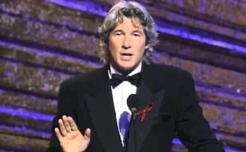 Richard Gere speaks on stage at the Annual Academy Awards.