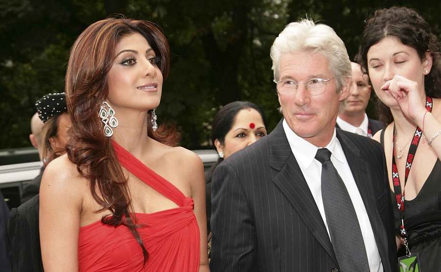 Shilpa Shetty and Richard Gere pose for the press.