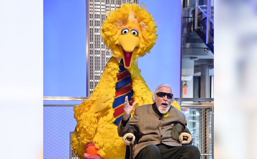 Big Bird And Puppeteer Caroll Spinney are at the Empire State Building.