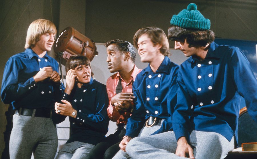 A photo of The Monkees behind the scenes.