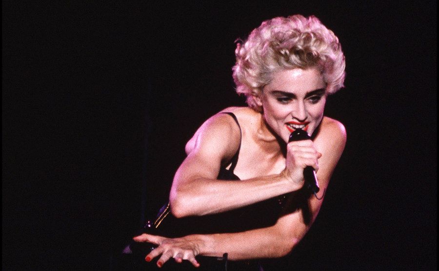Madonna performs on stage.