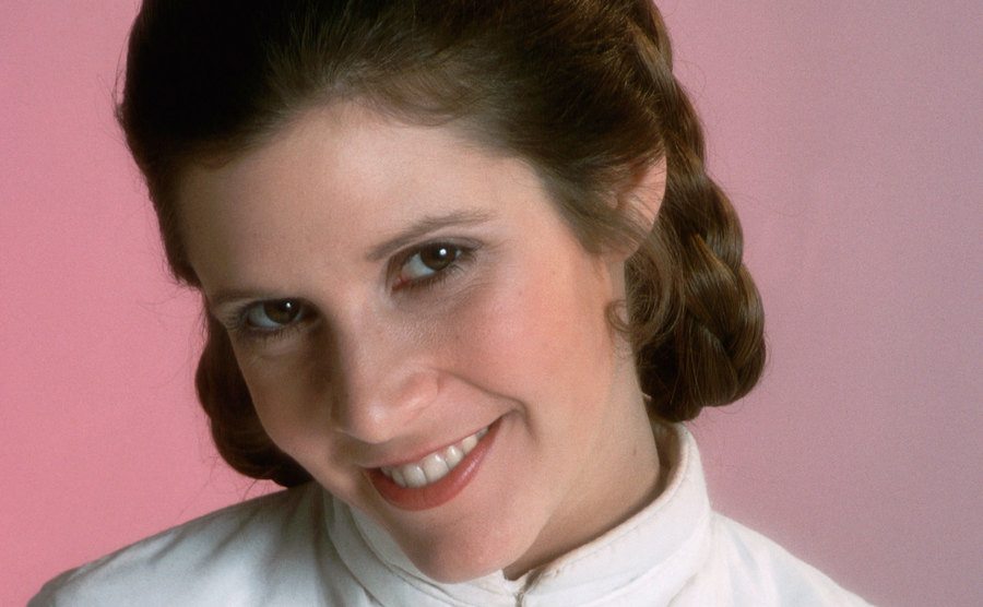 A studio portrait of Carrie Fisher.