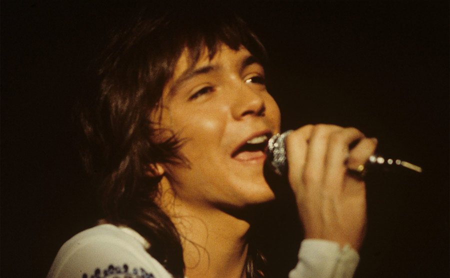 David Cassidy performs on stage. 