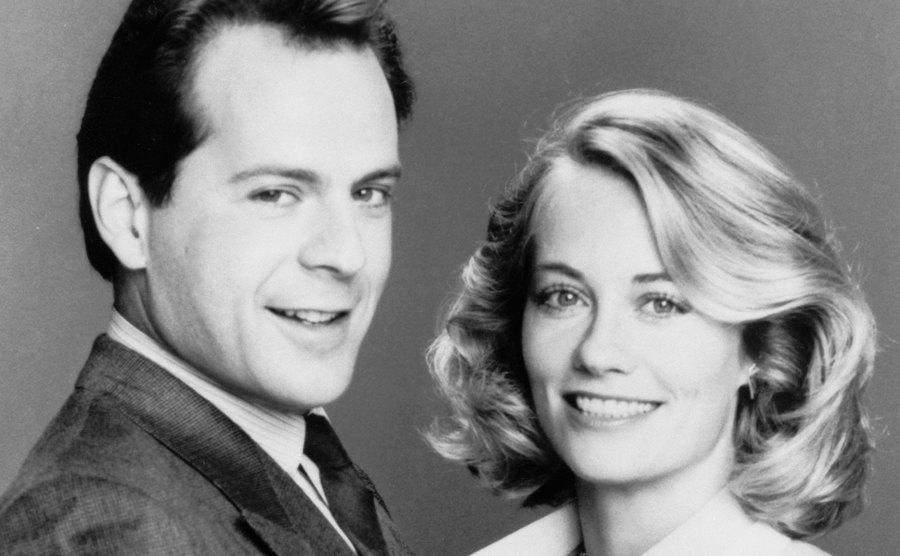 Bruce Willis and Cybill Shepherd in a promotional portrait for Moonlighting.