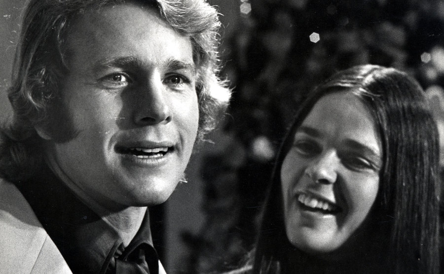 A photo of O’Neal and Ali MacGraw at the film premiere.